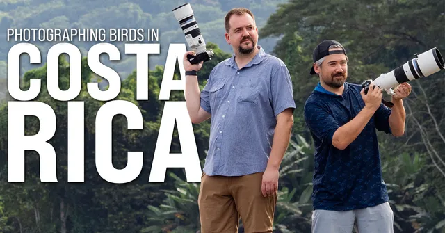 Two men holding large cameras with telephoto lenses stand outdoors in front of lush green trees. Large text reads "Photographing Birds in Costa Rica"…
